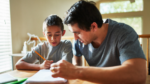 Parent helping child with homework because child is struggling with school. 