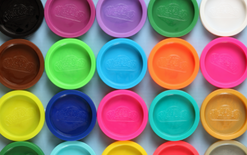 Small bins of playdoh to use as fidget items. 