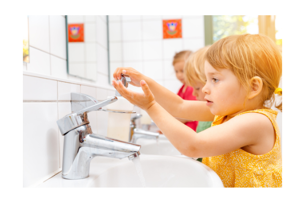 Child using task analysis for washing hands in the bathroom. 